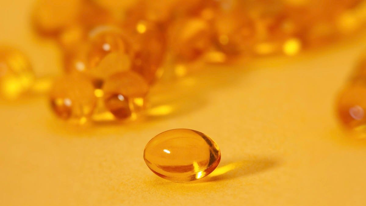 Best CBD capsules pills on yellow background